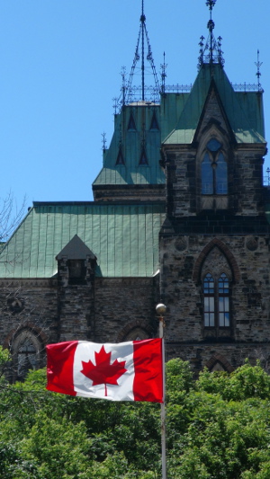 Canadian Flag with the Parliament Buildings